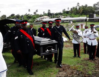 Members of the Police Force removing casket from the undertaker for placing in the tomb