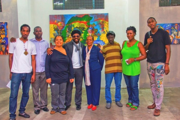 Group photo at the opening with collaborating artists and Senator Brenda Hood, Parliamentary Secretary for Culture (Nico, Roland, Suelin, PrensNelo, Senator Hood, Doliver, Andrea and Teddy)