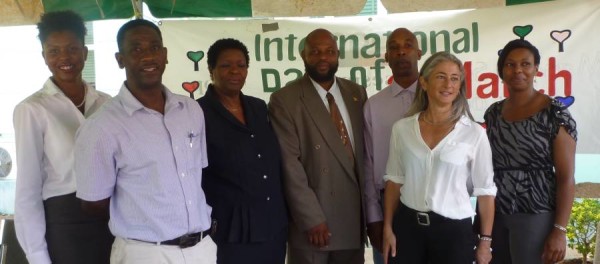 Hon Min Roland Bhola with Dove Conservation Team and Sandals Foundation Representative.