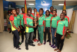 The Grenada Athletics Team pose with the Queen's Baton in Grenada on Saturday 8 March 2014. Grenada is nation 44 of 70 Commonwealth nations and territories to be visited by the Queen’s Baton. Photo from  Glasgow 2014 Commonwealth Games on flickr