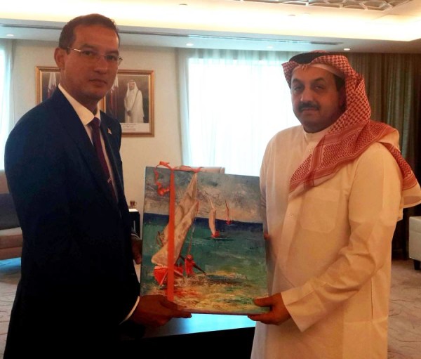 Minister Steele presents painting by Susan Mains to His Excellency Dr Khalid Bin Mohammed