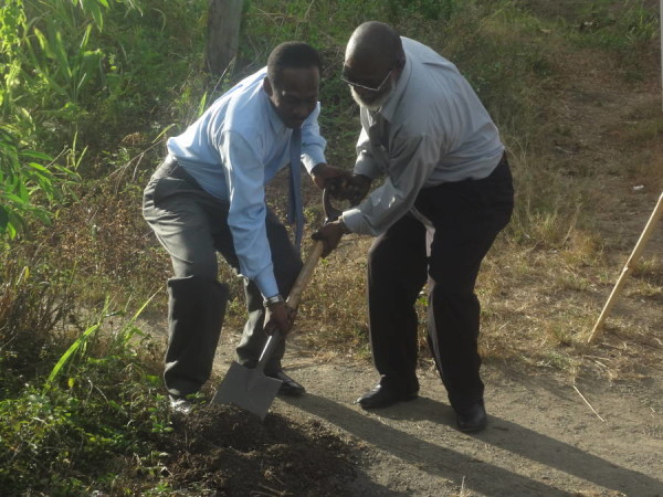 Minister Boatswain turns the sod with MAREP’s Bauxton Francois