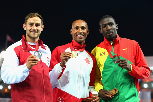 Kurt Felix of Grenada (right) bronze medal  8070 points Gold medalist Damian Warner of Canada (Center) 8282 points Silver medalist Ashley Bryant of England (Left) 8109 points