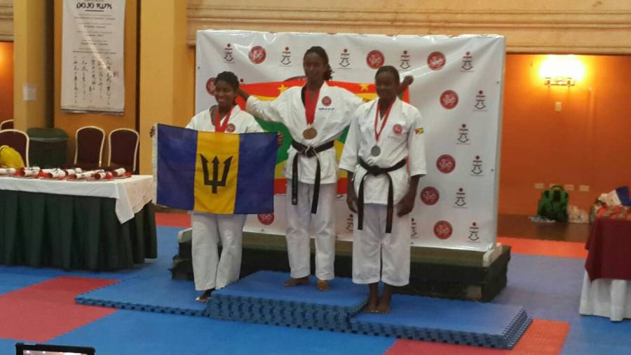 The Grenadian women receive their silver medal