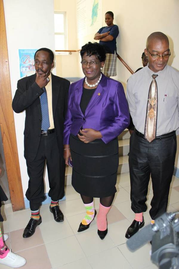MINISTER, P.S. & CEO display their socks