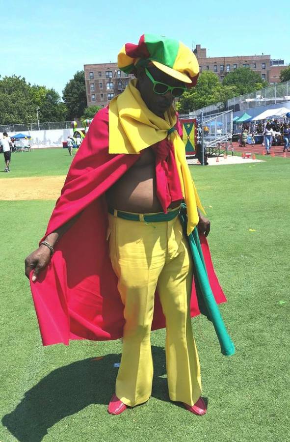 Grenada Day attendee, Palay Thomas, pridefully wearing Grenada's national colours in his original outfit