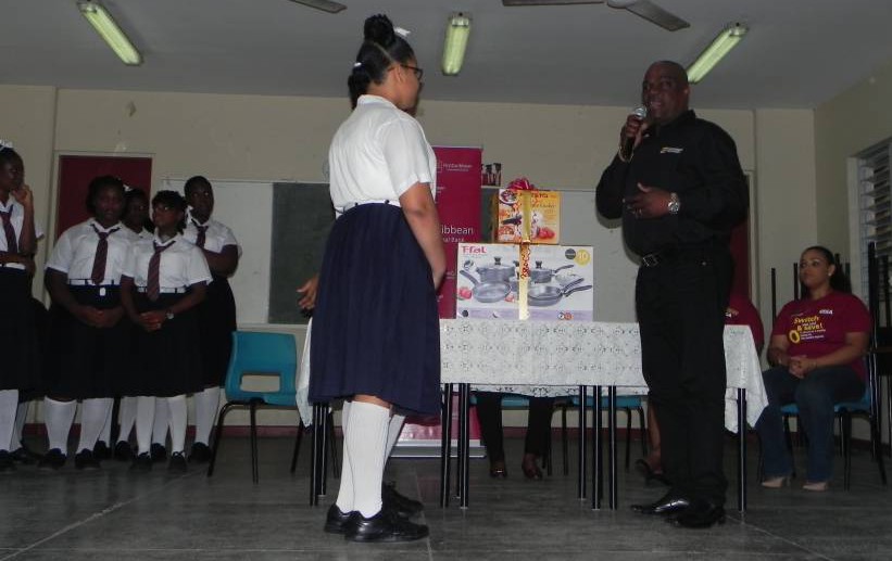 Geoffrey Gabriel Credit Manager Presents Culinary Utensils to Students
