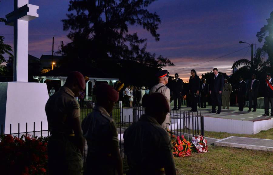 David Cameron walks with Prime Minister Mitchell through Botanical Gardens and lays a wreath as part of a memorial service held at sunset. Also present, Her Excellency Dame Cécile La Grenade, Governor General of Grenada. Photo by Georgina Coupe, Crown Copyright