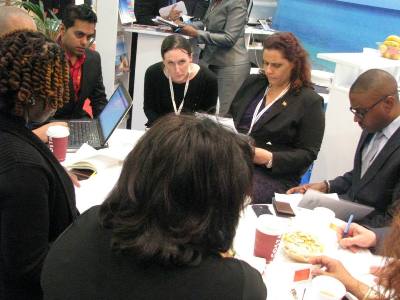 Grenada Tourism Minister in discussion at WTM 2013