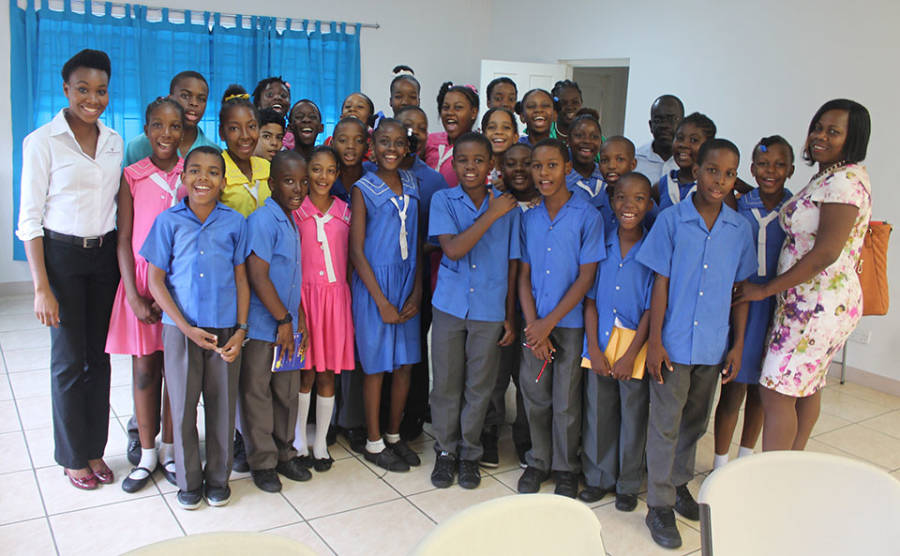 Tourism officials with students from the Beacon Learning Centre