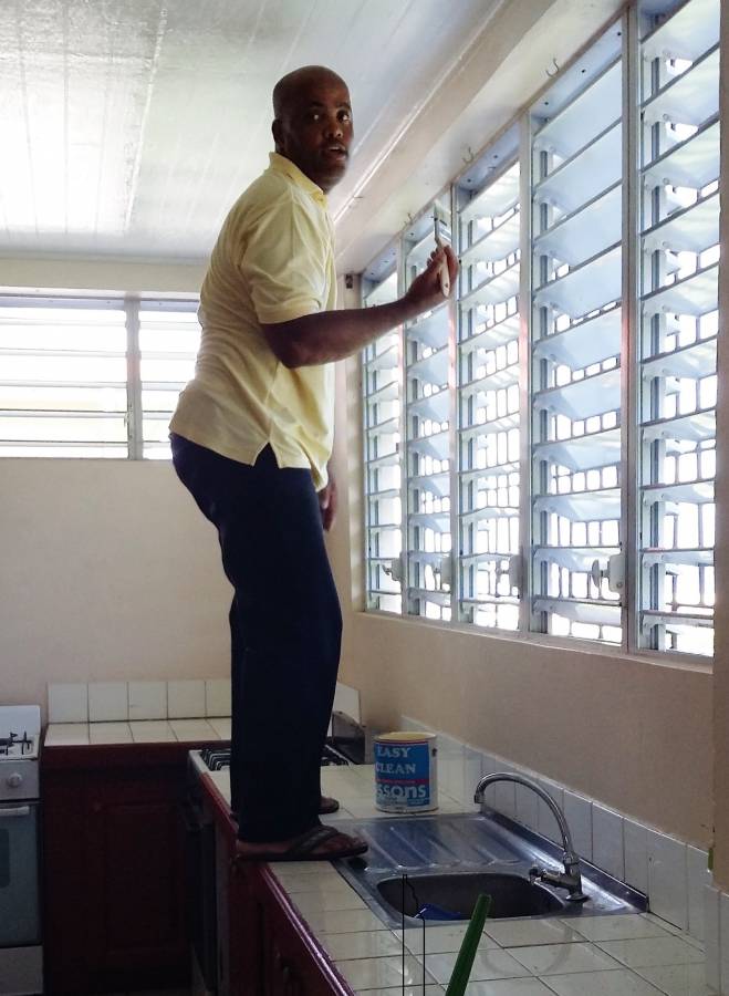 Retail Banking Manager Billy DeRoche Paints a Section in the Food Lab