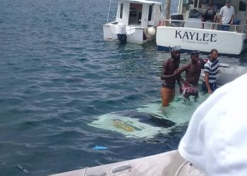 Breaking News: Bus submerged in Carenage