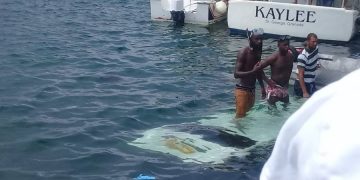 Breaking News: Bus submerged in Carenage