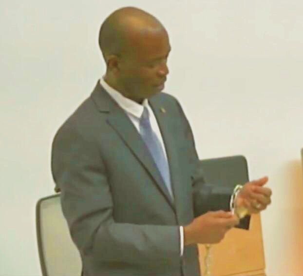Opposition Leader chains himself to Parliament table